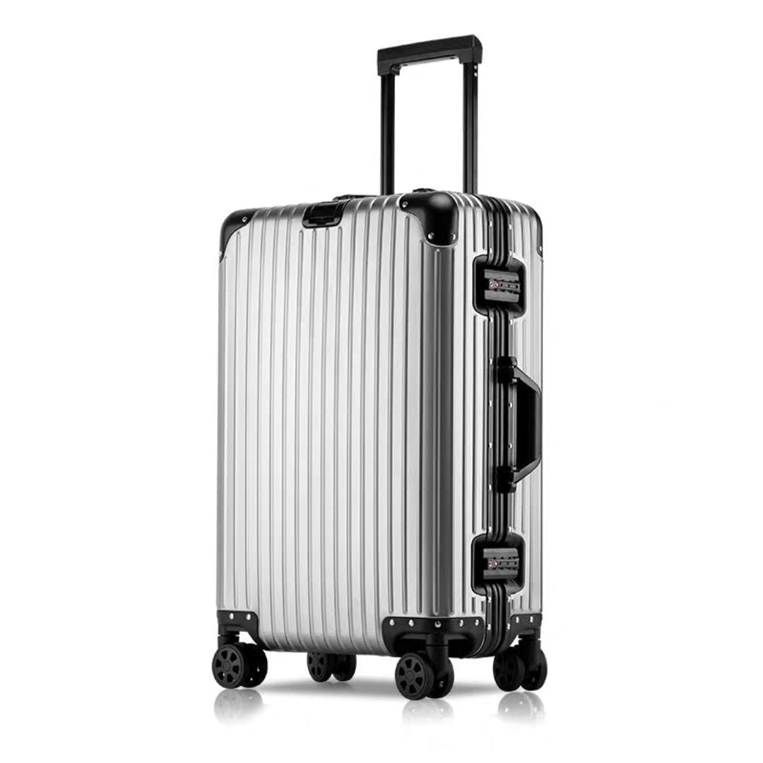 Silver suitcase with black wheels on a white background, featuring 'Black Grey' branding.