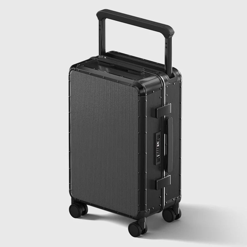 Black suitcase with wheels and handle on a light gray background
